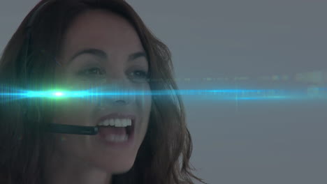 woman handling customer support call in business scene, showing headset mic and neon lens flare
