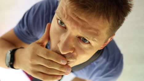 close-up of a man looking up, showing various expressions
