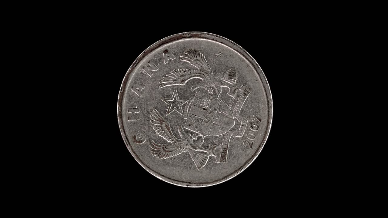 Ghana 2007 20 pesewas coin obverse with coat of arms rotating on black background