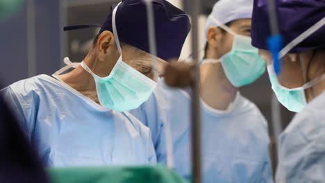 group of surgeons at the work