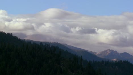 clouds roll over the sierra nevada mountains near lake tahoe