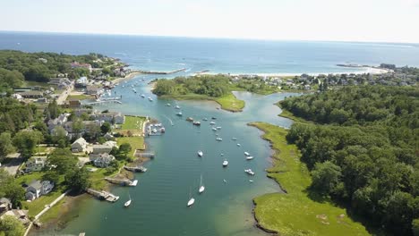 aerial view: boats heading out to sea