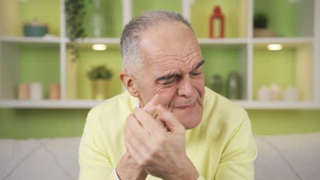 close-up portrait of tense and stressed old man.