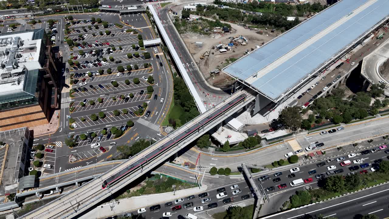 Train arriving at Santa Fe station in Mexico City, filmed by a 4K drone