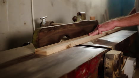 man using a wood planer