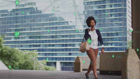 animation of business data over african american woman using smartphone