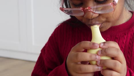 child playing a simple instrument