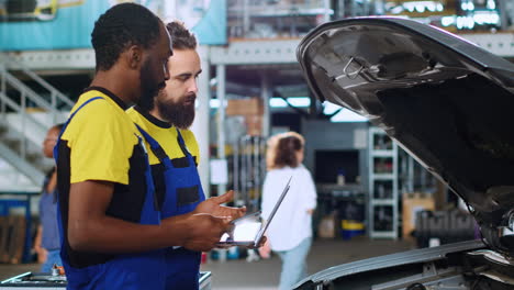 Repairmen-in-car-service-order-new-parts