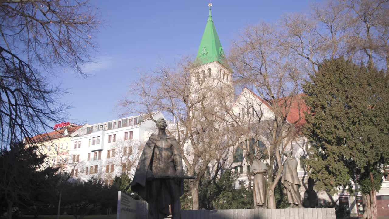 Statues and church at the Slovakian Uprising memorial in Bratislava
