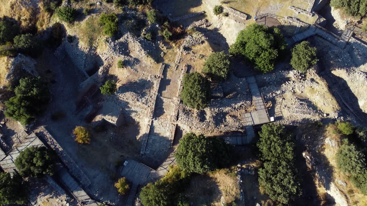 Troy ancient city in present-day Hisarlık at sunset. Aerial top down
