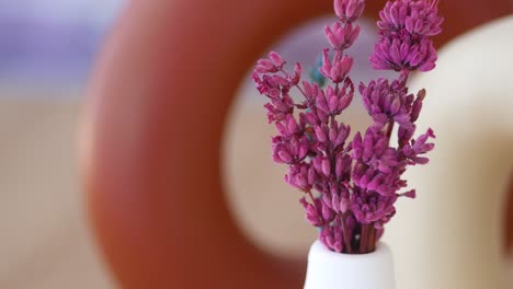 dried lavender flowers in a white vase