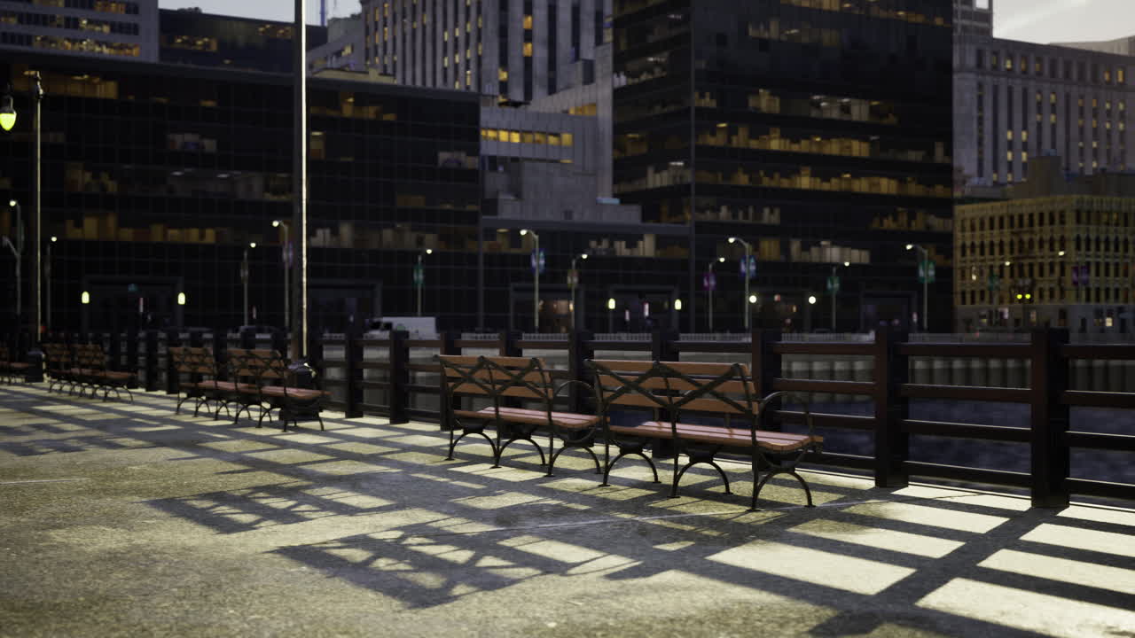 Benches line the waterfront promenade at dusk in a bustling city