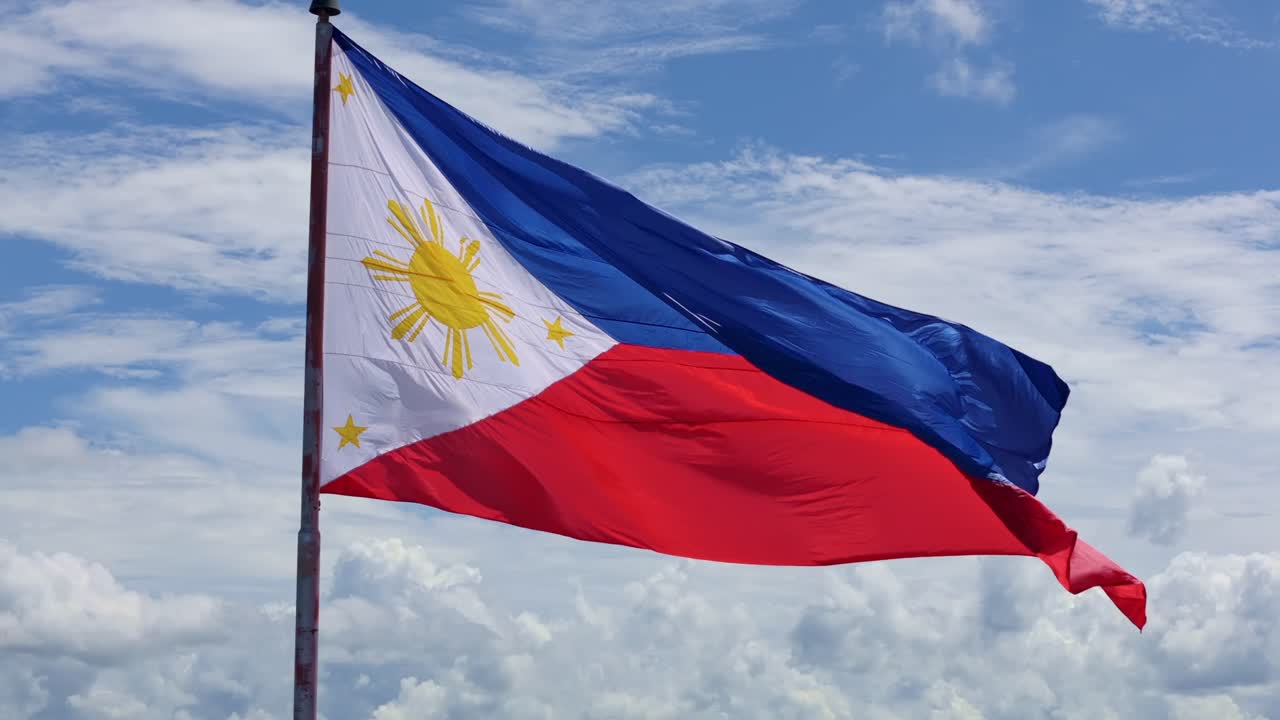 Sunrise Philippine Flag Displayed Proudly Against Azure Sky