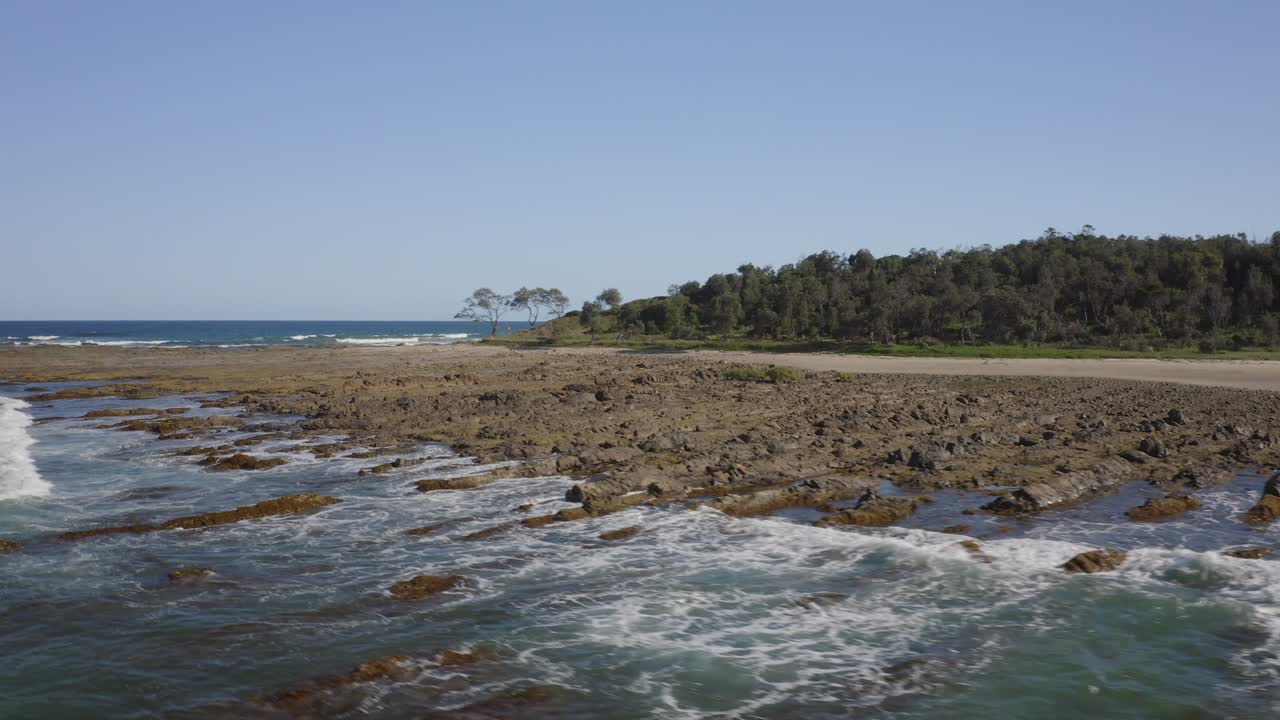 Cabo de Wooli, NSW, tomada aérea sobre a água