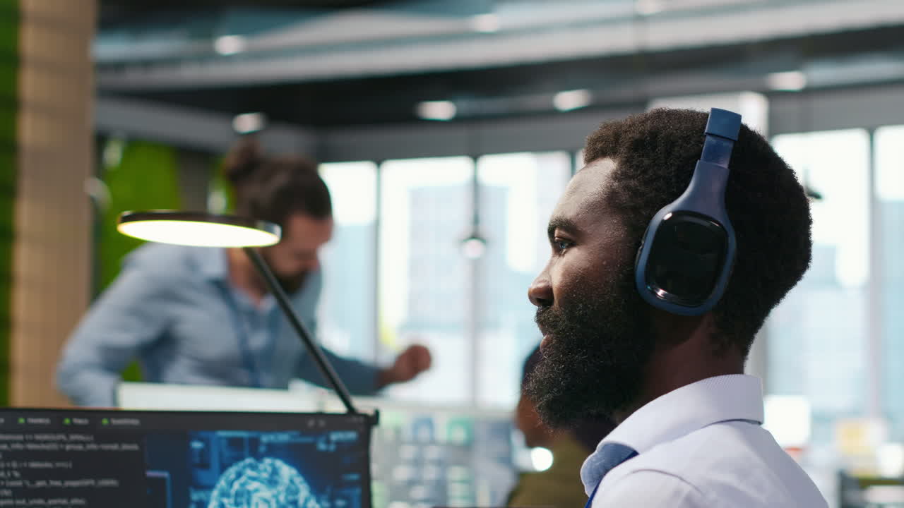 Programmer In Office Relies On Ai Machine Learning To Automate Repetitive Tasks