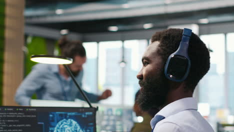 programmer in office relies on ai machine learning to automate repetitive tasks