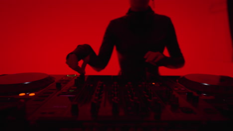 woman djing at a club