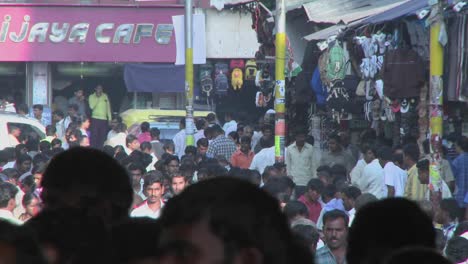 People-are--walking-down-an-extremely-crowded-street