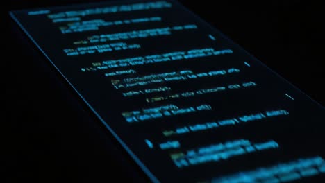 digital code displayed on a dark screen