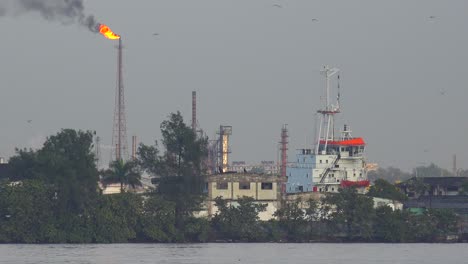 Harbor-ferry-boats-pass-in-Havana-harbor-Cuba-with-an-industrial-scene-as-a-backdrop-1