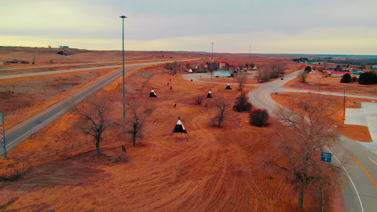 Teepees at the Colorado Welcome Center Rest Area Overlooking Arid Plains