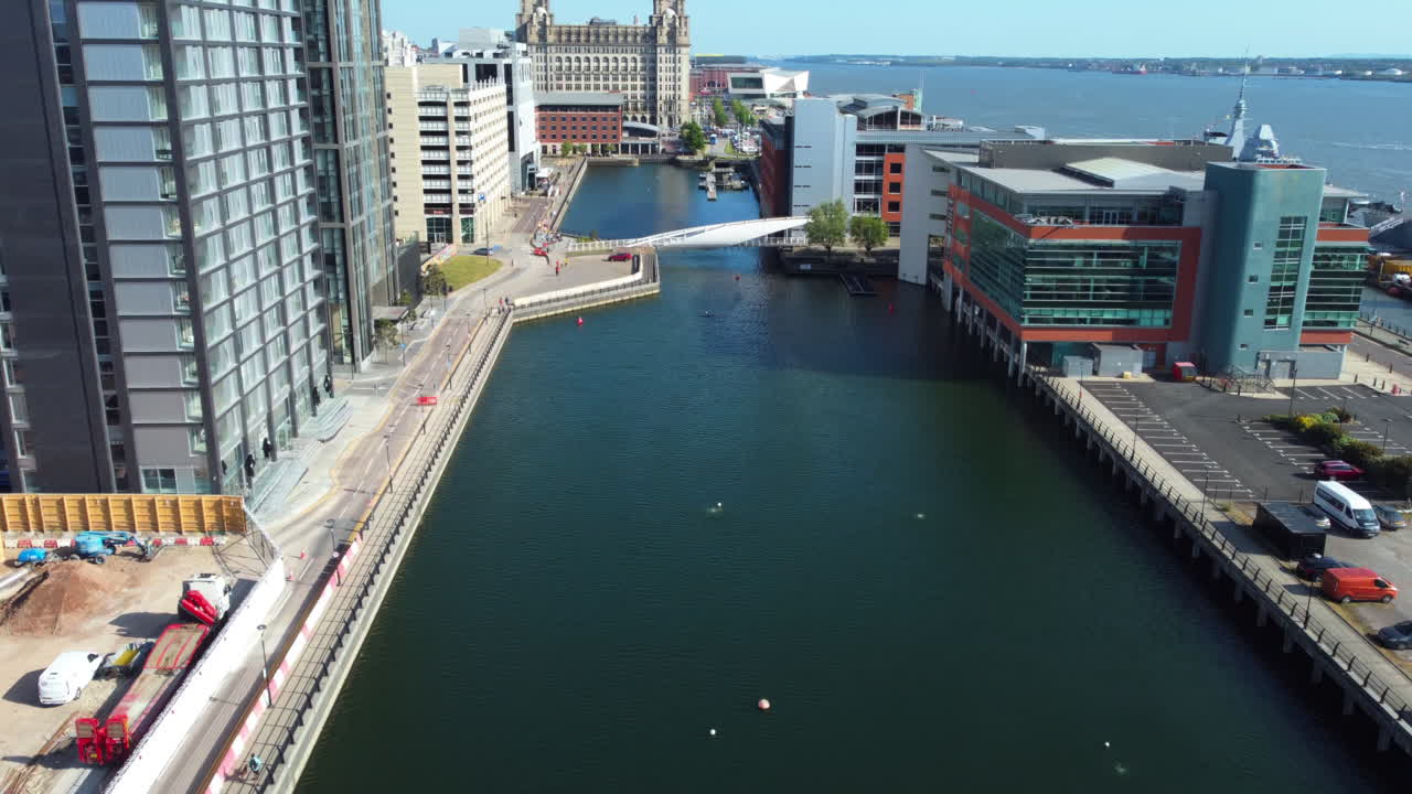 LIVERPOOL, UNITED KINGDOM - MAY 10 2023: Aerial drone view of city and port