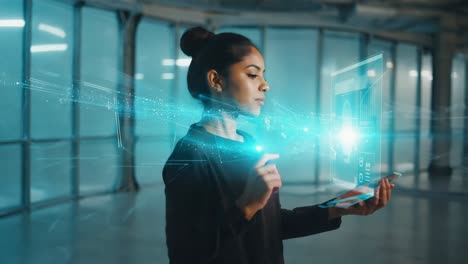 woman interacting with futuristic holographic display