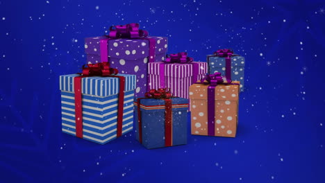 animación de copos de nieve que caen sobre los regalos de navidad