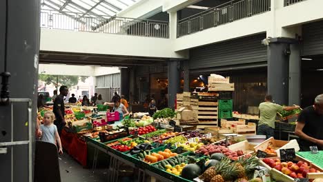 vibrant market scene with fresh produce and shoppers