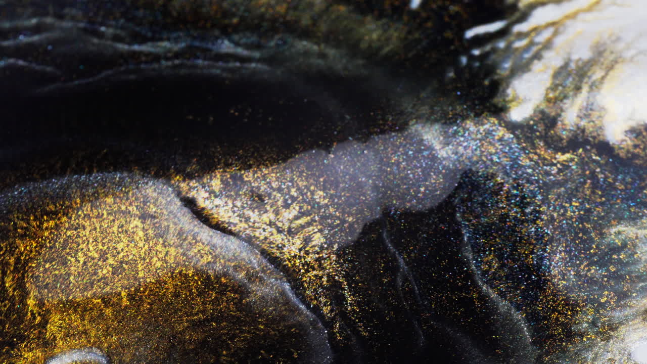 Play of light and shadow on dense moving ink. Macro view