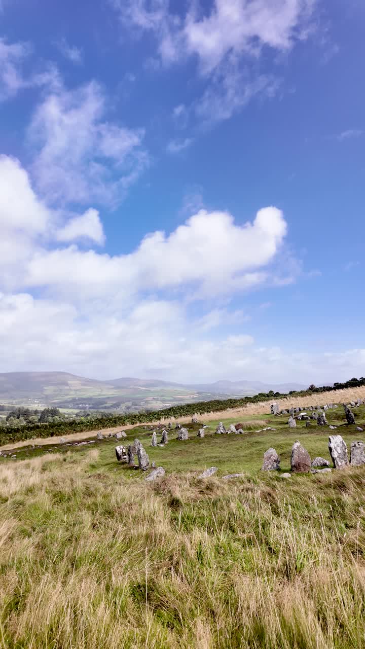 Ancient stone circle and settlement site at Braaid, Isle of Man, a historical landscape. vertical video
