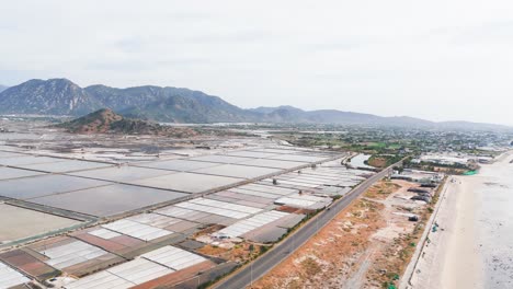 aerial view dolly of the mountains and the farm in ninh thuận.