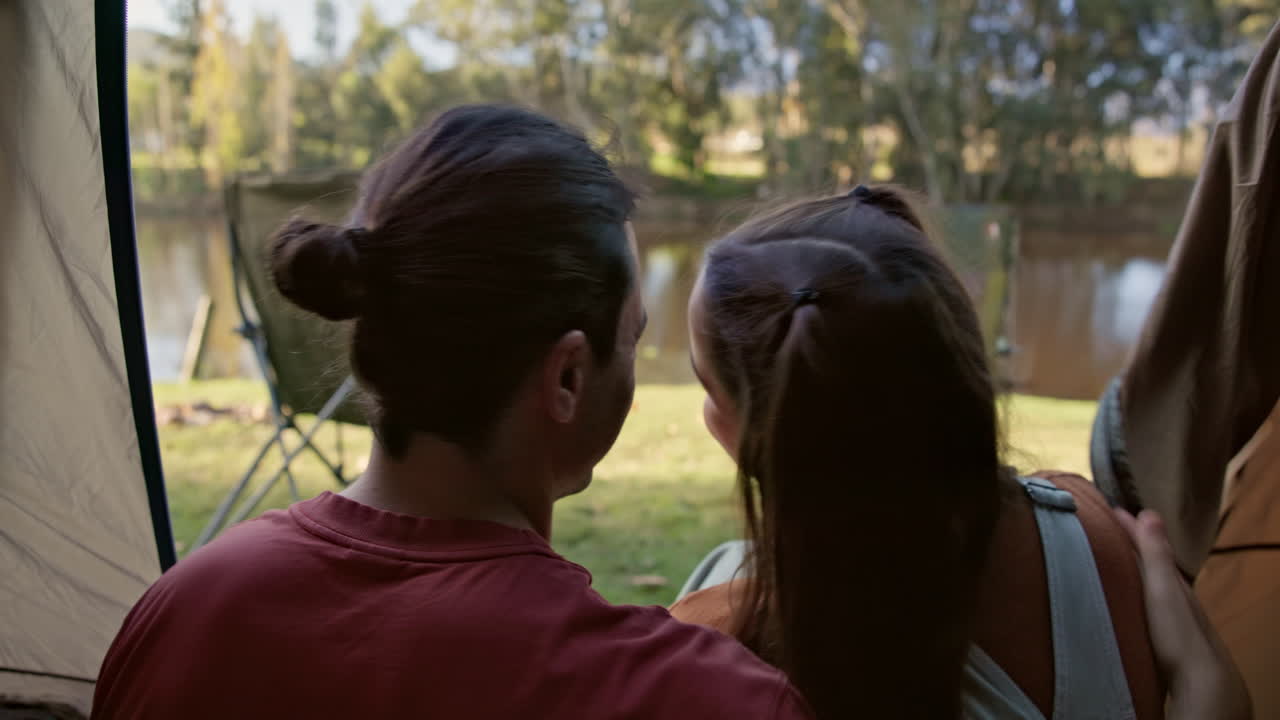 Back, camping and smile with a couple in a tent