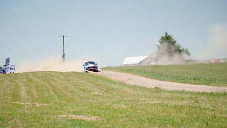 Car-coming-from-afar-in-a-dust-cloud-slow-motion