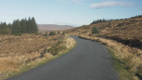 Push-in-shot-on-a-road-in-the-mountains-in-Ireland