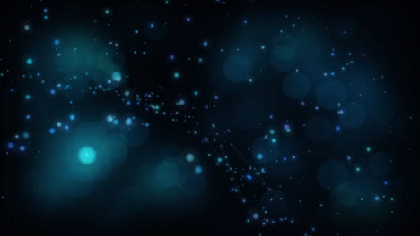 video generado digitalmente de manchas brillantes azules contra un fondo negro