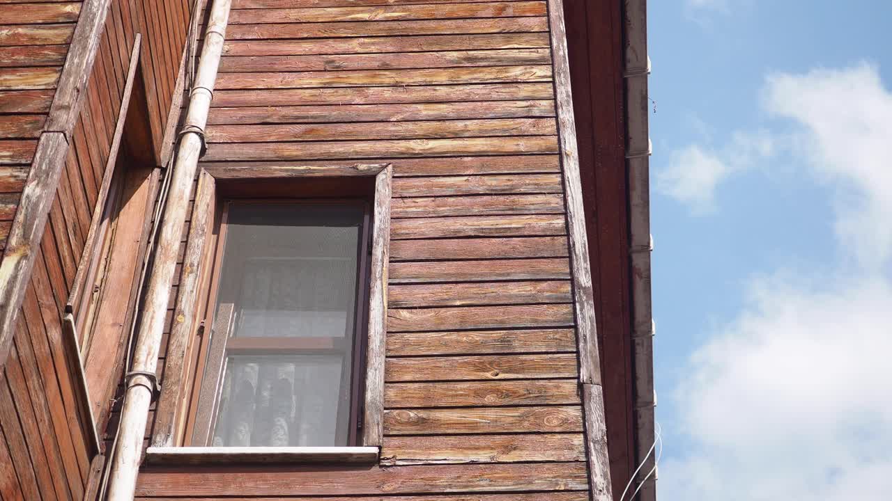 Exterior of a wooden building with a window