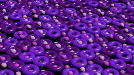escena de renderización 3d abstracta con toros y bolas multicolores animados. bucle sin costuras gráfico de movimiento moderno y satisfactorio