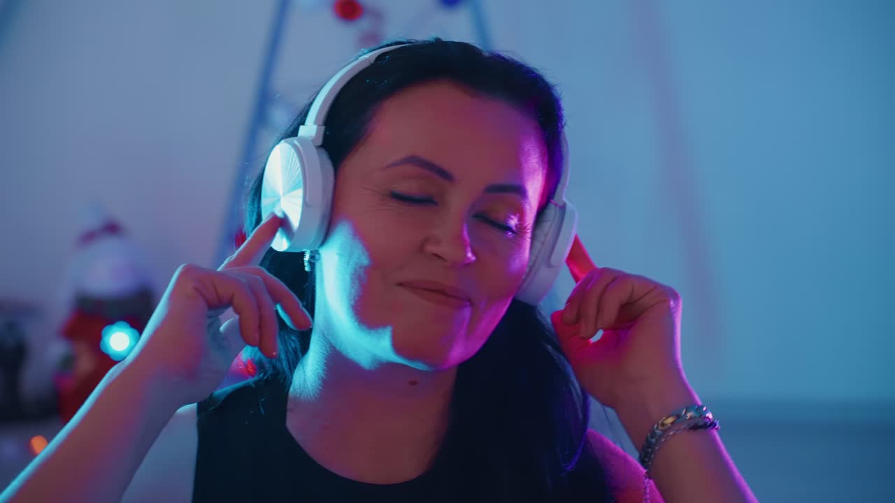 Woman enjoying music at a Christmas party