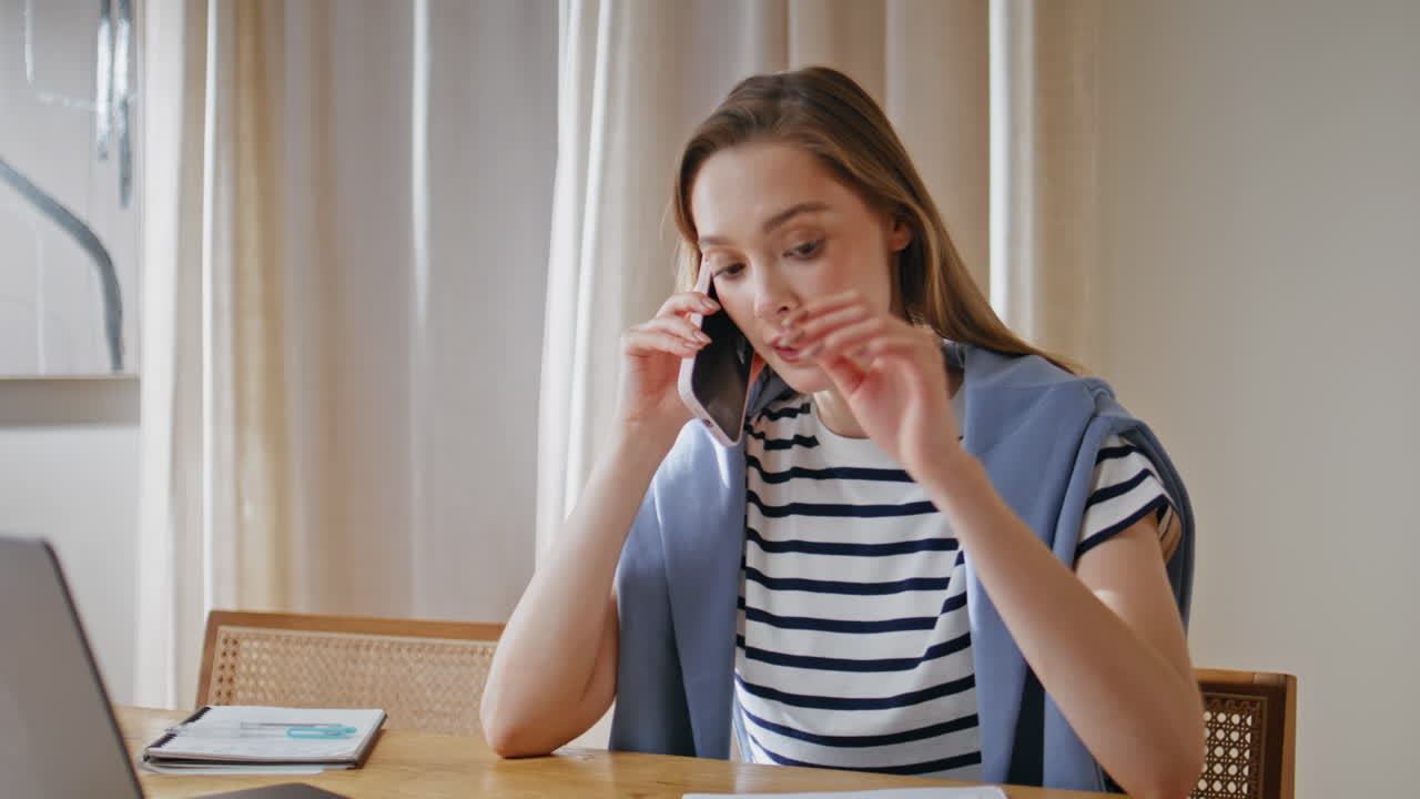 Professional manager talking cellphone in office closeup. Woman engaged in call