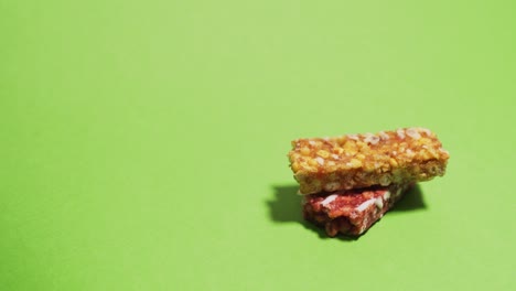 granola bars stack on top of each other stop motion against chromakey 4k