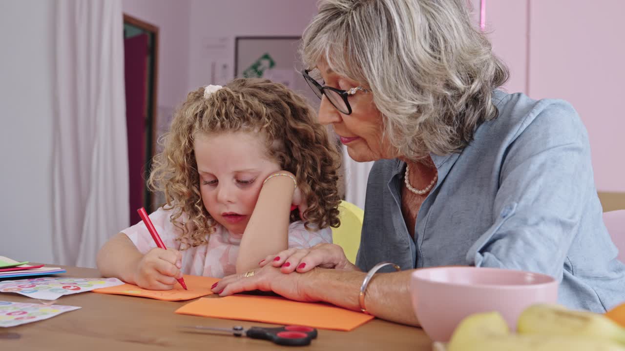 Grandmother and Grandchild Drawing Together