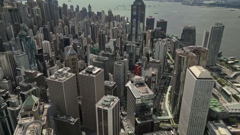 Aerial-of-skyline-of-Hong-Kong-island-and-harbour,-Hong-Kong