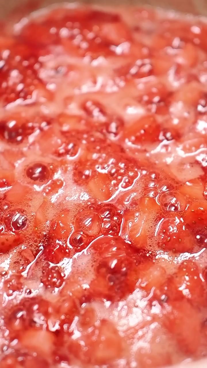Strawberries Simmering in a Pot to Make Jam