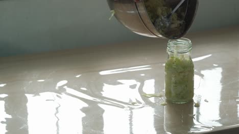 homemade sauerkraut - pouring liquid sauce on pickled cabbage. - closeup shot