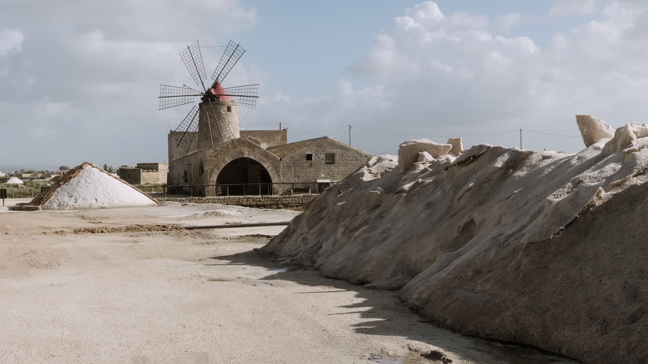 Ancient Windmill and Salt Flats in Sicily