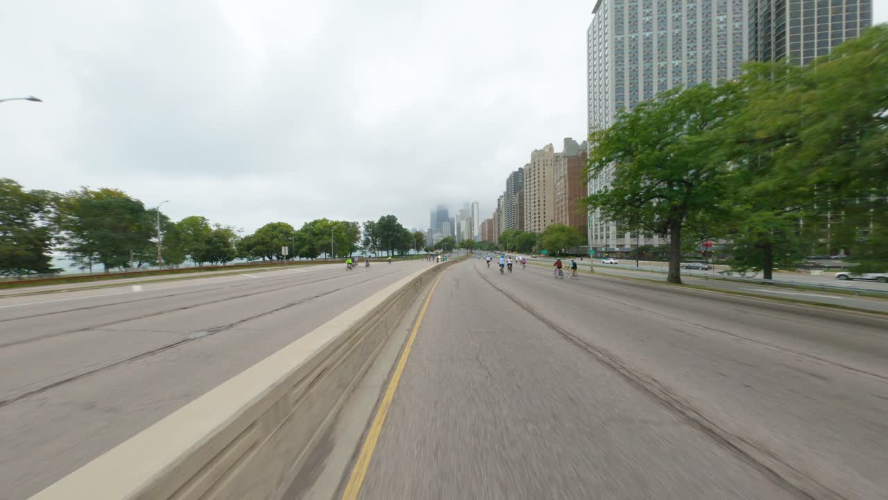 Chicago cyclists riding southbound on DuSable Lake Shore Drive during Bike the Drive 2022 getting close to downtown