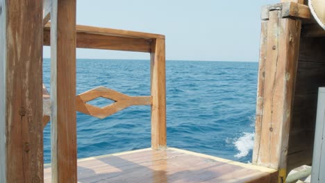 sea and horizon seen from wooden boat in komodo island seascape in indonesia