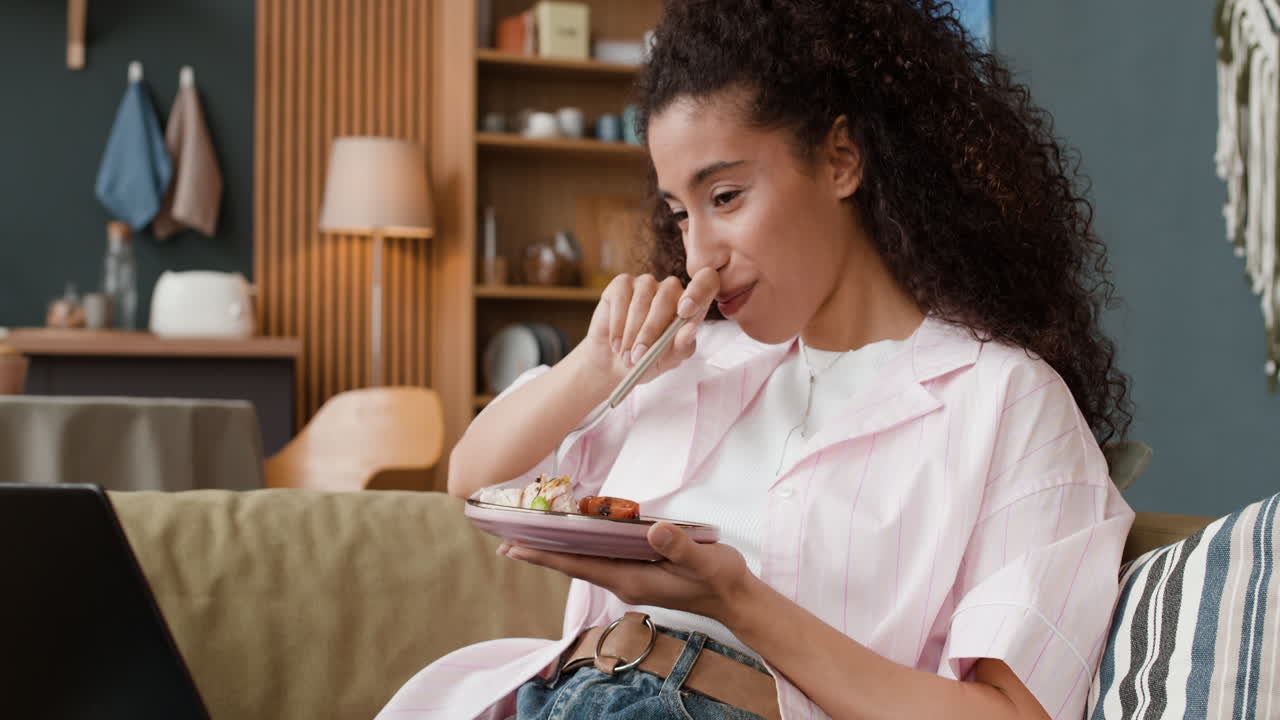Woman Enjoying a Casual Meal at Home