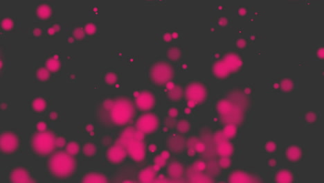 los confeti rosados caprichosos caen elegantemente contra el cautivador negro
